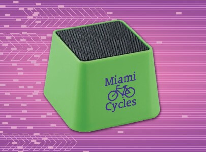 Small Green, Portable, Bluetooth Speaker imprinted with Miami Cycles logo perfect for desktop listening.